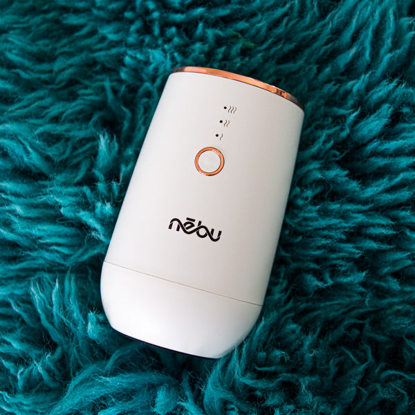 NL50 Portable Nebu Diffuser in a styled room